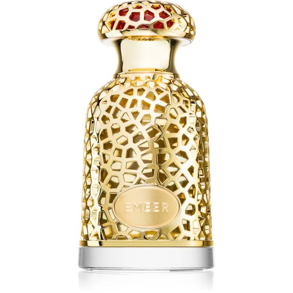 Frasco de perfume dourado com padrão geométrico recortado e base transparente