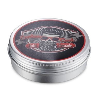 Lata metálica redonda com rótulo preto e vermelho com crânio e texto Pomade.