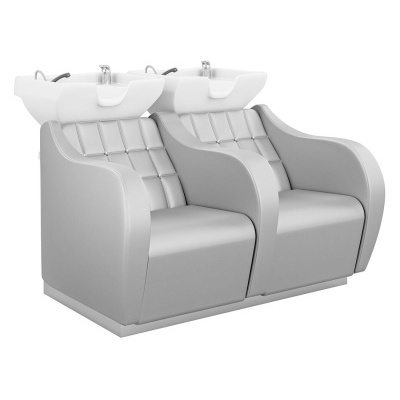 Poltrona dupla cinza com lavatórios brancos para salão