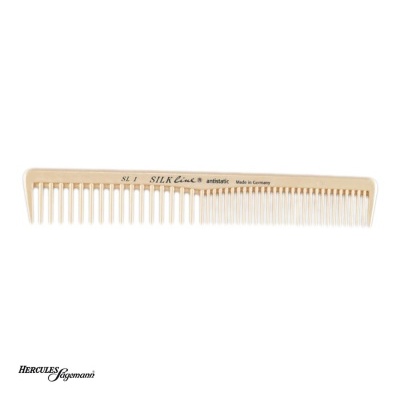 Pente bege com dentes largos e finos e texto impresso