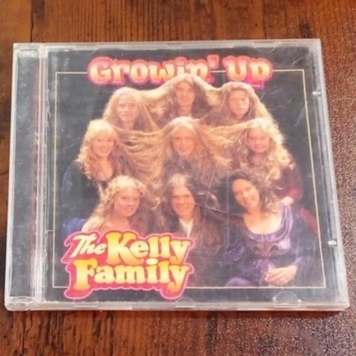 Caixa de CD do álbum 'Growin' Up' de The Kelly Family
