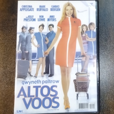 Capa de DVD do filme ALTOS VOOS com Gwyneth Paltrow em vestido laranja.