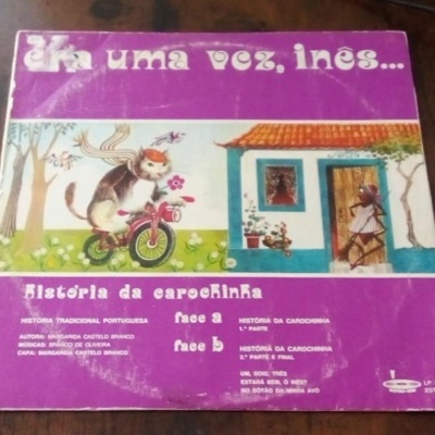Capa de disco em vinil com fundo roxo e ilustração colorida