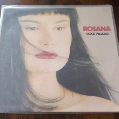 Capa de disco de vinil com rosto feminino e texto ROSANA DOCE PECADO
