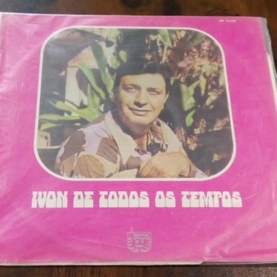 Capa de disco vinil rosa com foto de homem e texto IVAN DE TODOS OS TEMPOS