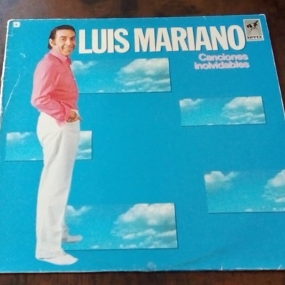 Capa de disco azul com homem em camisa rosa e calças brancas, texto Luis Mariano e Canciones inolvidables