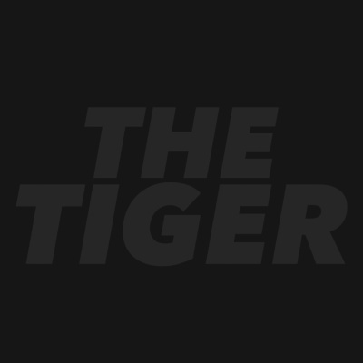 Texto 'THE TIGER' em cinza escuro sobre fundo preto