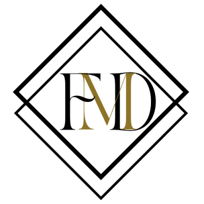 Logo dourado com letra M sobre fundo preto