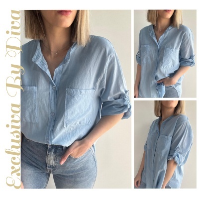Camisa azul clara de tecido leve com botões e bolsos frontais, mangas arregaçadas