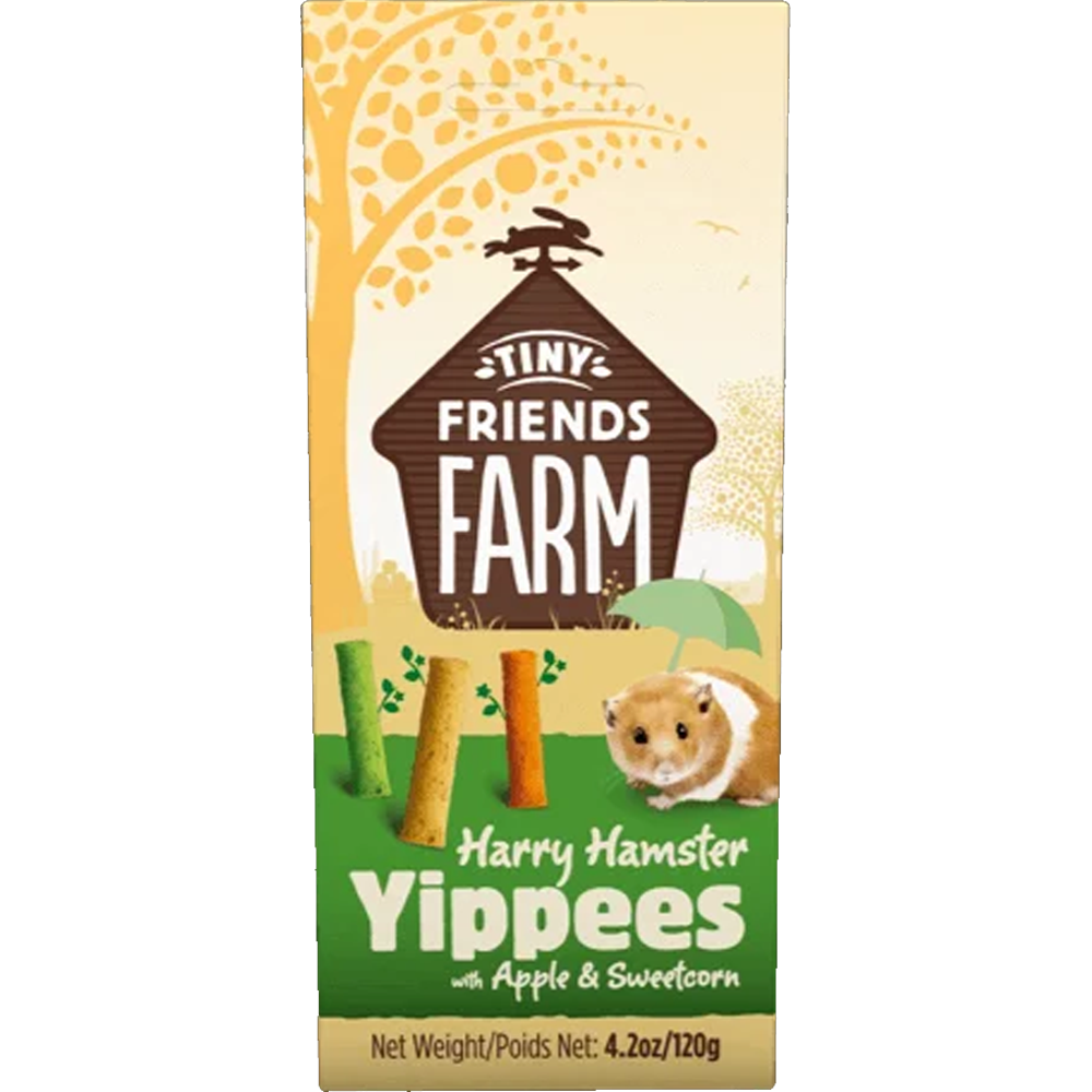 Harry Yippees - Cenoura e Maçã Caixa de snacks para hamster com imagem de hamster e snacks, texto TINY FRIENDS FARM e Harry Hamster Yippees.