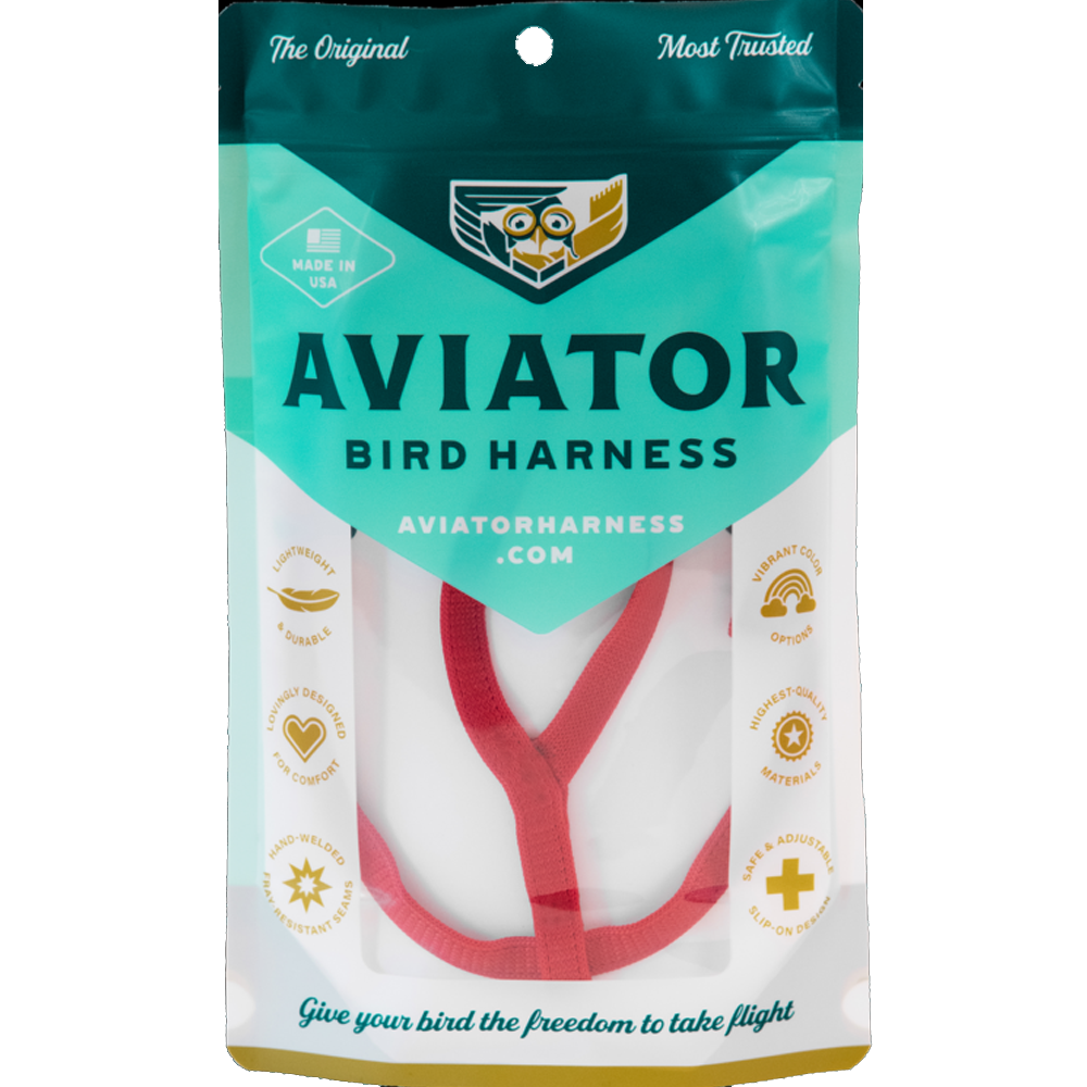 Aviator Vermelho - Bird Harness Embalagem azul e branca com arnês para pássaros vermelho visível e texto Aviator Bird Harness