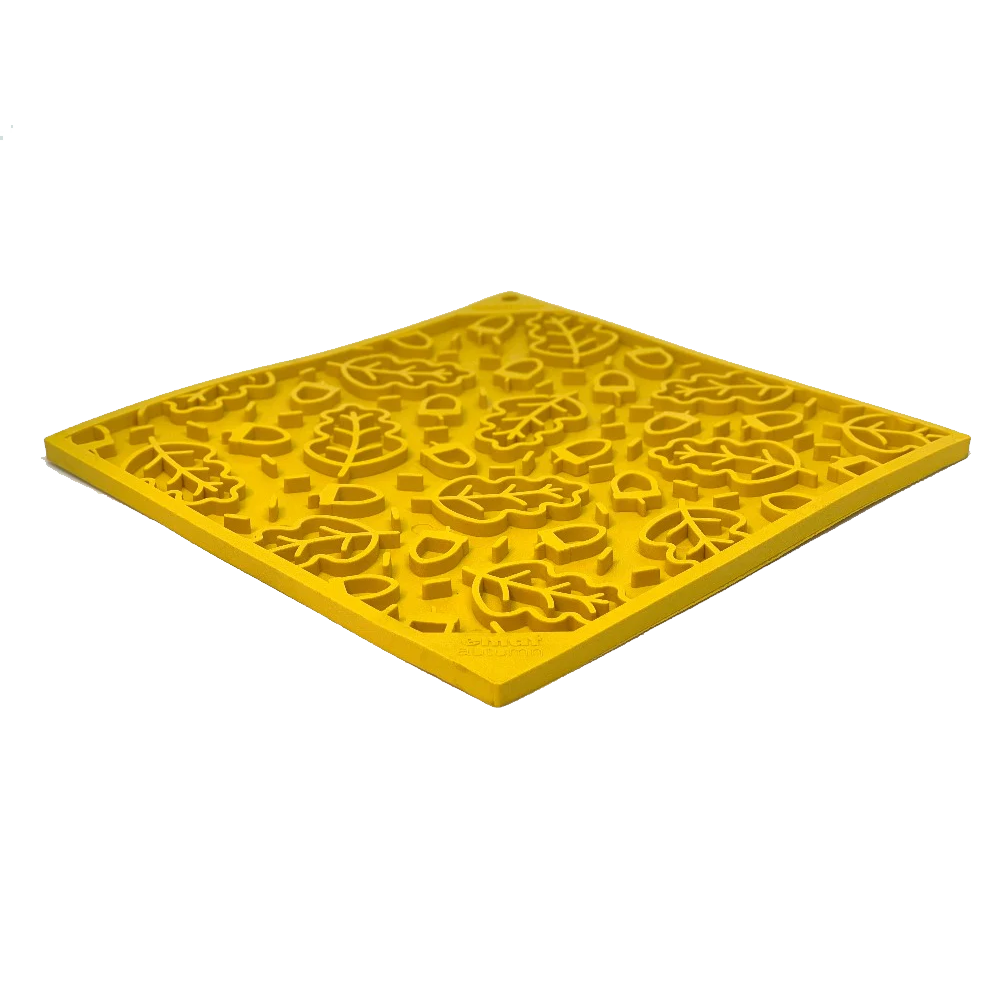 Tapete para Lamber Outono eMat LickMat Tapete táctil amarelo com padrão em relevo de folhas e formas geométricas
