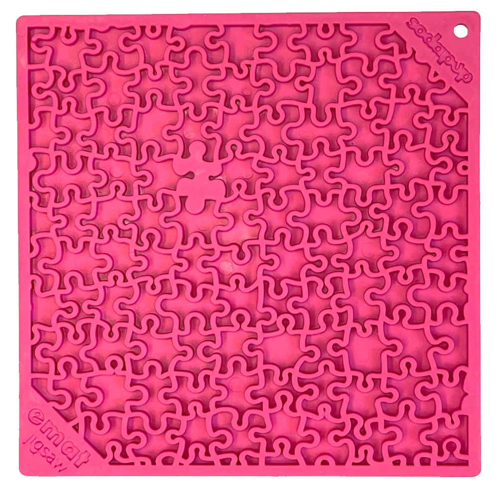 Tapete de lamber Puzzle eMat! LickMat Tabuleiro rosa de puzzle em silicone com peças interligadas e texto 'endless jigsaw'