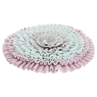 Almofada redonda colorida com padrões de flores em tecido franzido