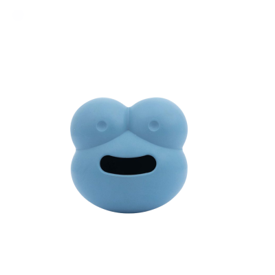 Brinquedo de borracha azul com formato de rosto e boca aberta
