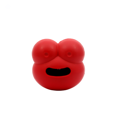 Objeto vermelho de borracha com duas protuberâncias arredondadas e uma abertura