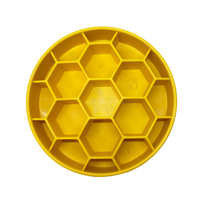 Prato amarelo redondo com divisórias hexagonais e desenhos de abelhas