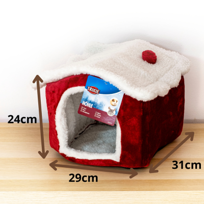 Casa para animais de estimação vermelha e branca com tecto em pelo e etiqueta da marca TRIXIE