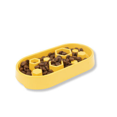 Comedouro amarelo para ração seca com relevo hexagonal