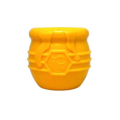Pote amarelo plástico com relevo de abelha e textura de mel escorrendo