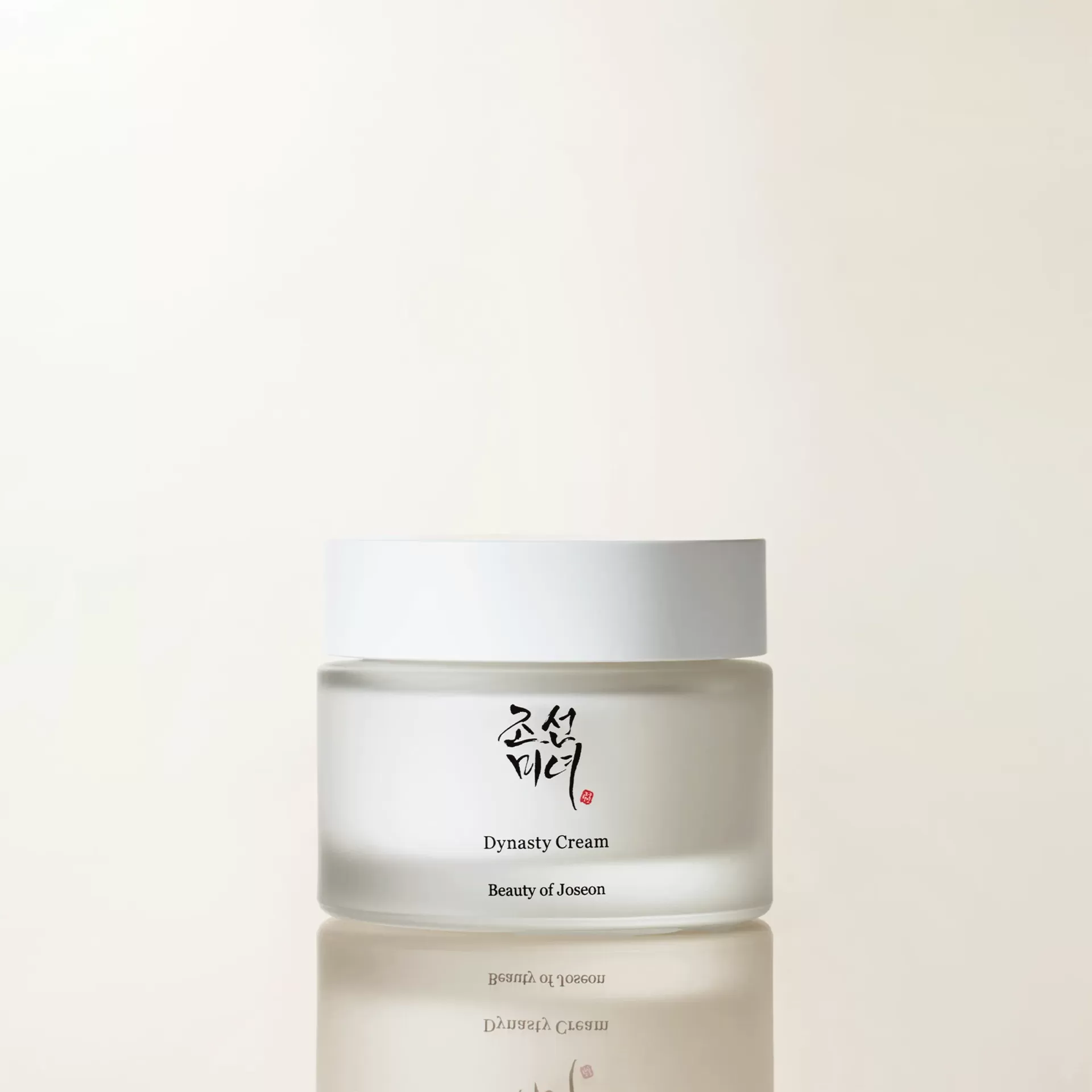 Creme Facial Beauty of Joseon Dynasty 50 ml Hidratação Profunda Frasco de vidro fosco com creme e tampa branca em fundo claro
