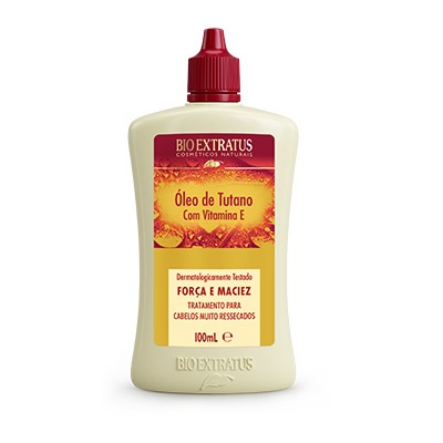 Bioextratus Oleo Tutano com Vitamina E 100ml Frasco branco com tampa vermelha de óleo de tutano Bio Extratus para cabelos ressecados