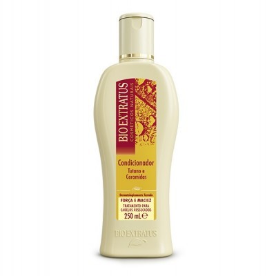 Frasco de condicionador Bio Extratus Tutano e Ceramidas creme com tampa e rótulos em vermelho e amarelo