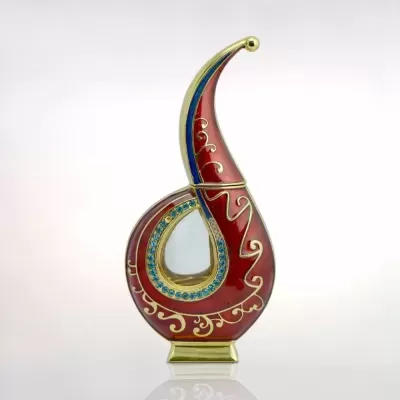 Estatueta decorativa vermelha e azul com detalhes dourados