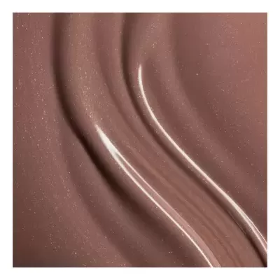 Superfície de líquido castanho brilhante com um risco translúcido claro