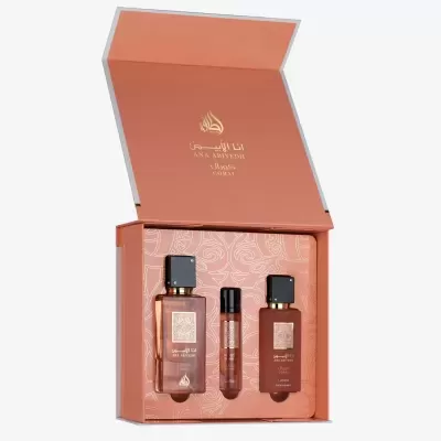 Conjunto de perfumes ANA ABIYEDH CORAL da marca Lattafa em embalagem rosa coral aberta.