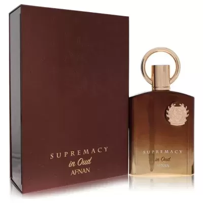 Frasco de perfume SUPREMACY in Oud da AFNAN ao lado da caixa