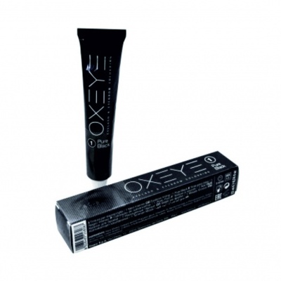 Tubo cosmético preto com texto branco OXEYE Pure Black ao lado da caixa correspondente