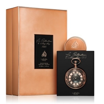 Fragrância La Collection Intemporelle 1505 em embalagem preta e bronze com design de relógio