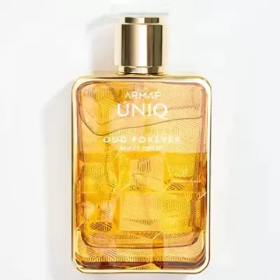 Frasco de perfume dourado Armaf Uniq Oud Forever com tampa dourada sobre fundo branco