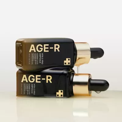 Frascos de sérum preto com conta-gotas dourados AGE-R