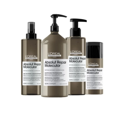 Produtos L'Oréal Absolut Repair Molecular com embalagens castanhas e tampas pretas