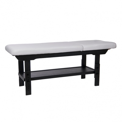 Cama de massagem com almofadado branco e estrutura preta