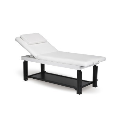 Cama de massagem branca com estrutura preta e almofada