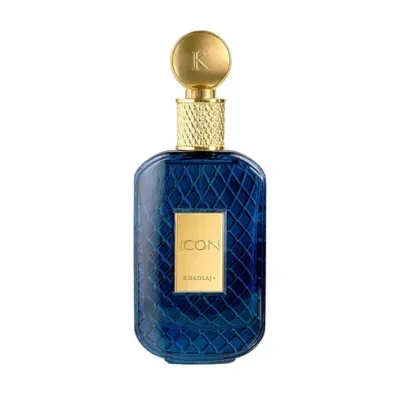 Frasco de perfume azul escuro com tampa dourada e etiqueta dourada