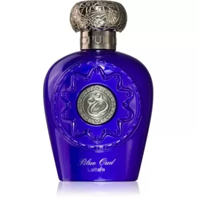 Frasco de perfume azul escuro com tampa metálica e emblema circular