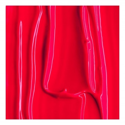 Superfície vermelha brilhante com reflexos de luz