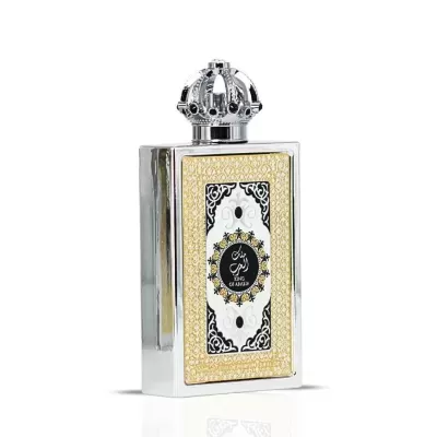 Frasco de perfume retangular prateado com tampa de coroa e etiqueta decorativa dourada e preta