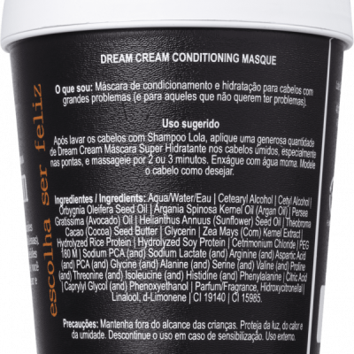 Frasco preto e branco com rótulo detalhado de máscara condicionadora para cabelo Dream Cream Conditioning Masque.
