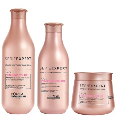 Produtos L'Oréal Série Expert A-OX Vitamin Color em embalagens rosa dourado