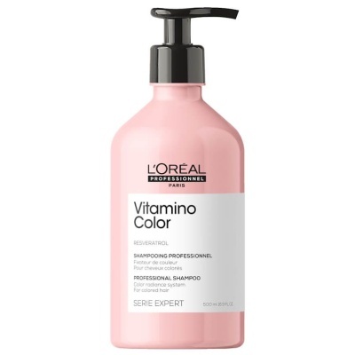Frasco rosa de champô L'Oréal Vitamino Color com doseador preto e rótulo branco