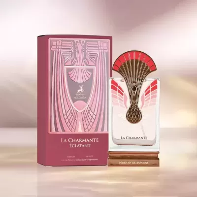 Frasco de perfume La Charmante Éclatant e embalagem rosa ao lado