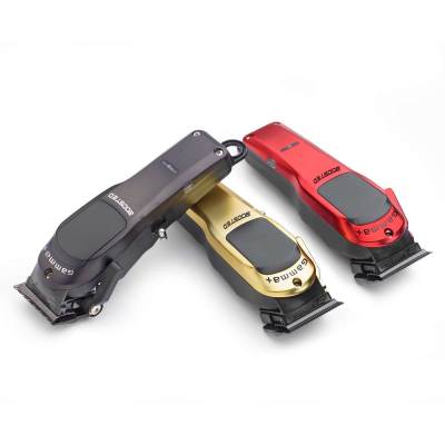 Máquinas de cortar cabelo Gama preto, dourado e vermelho