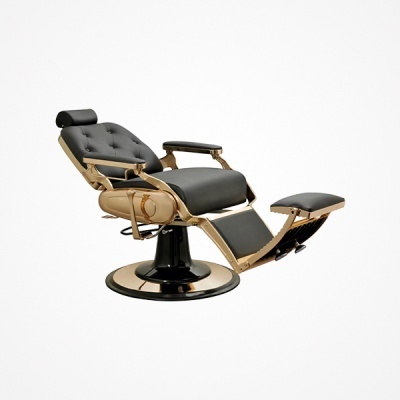 Cadeira de barbear vintage preta e dourada com apoio de pés