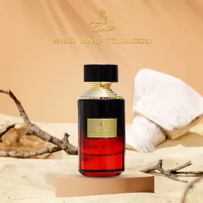Frasco de perfume Emir Wild and Tobacco vermelho e preto com detalhes dourados