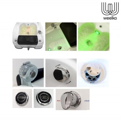 Banheira de hidromassagem branca com luzes LED verdes e controlos cromados